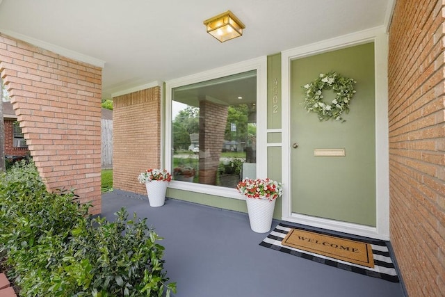 4502 Lido Ln, Houston, TX 77092 - view of exterior entry featuring brick siding and covered porch