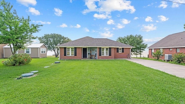 281 Fishermans Bend Dr, Point Blank, TX 77364 - single story home with central AC, a front yard, brick siding, and concrete driveway