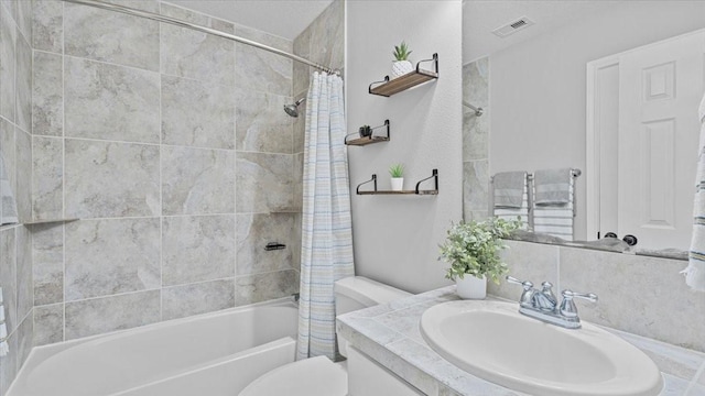 281 Fishermans Bend Dr, Point Blank, TX 77364 - bathroom featuring shower / bath combo with shower curtain, toilet, and vanity
