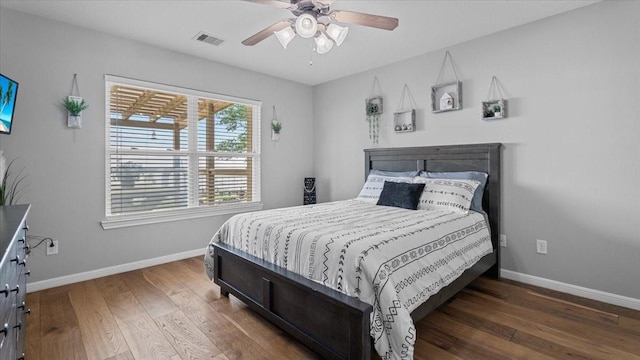 281 Fishermans Bend Dr, Point Blank, TX 77364 - bedroom featuring wood finished floors, baseboards, and a ceiling fan