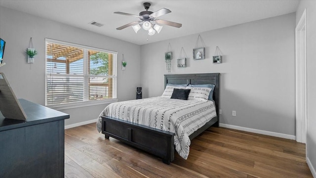 281 Fishermans Bend Dr, Point Blank, TX 77364 - bedroom featuring baseboards, wood finished floors, and ceiling fan