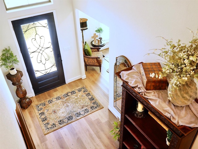 2038 Green Haven Ct, Missouri City, TX 77459 - foyer featuring wood finished floors and baseboards