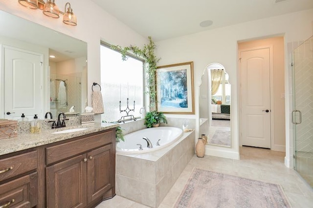 2038 Green Haven Ct, Missouri City, TX 77459 - ensuite bathroom featuring a shower stall, healthy amount of natural light, and a bath