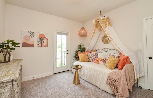 2038 Green Haven Ct, Missouri City, TX 77459 - carpeted bedroom featuring baseboards and access to outside