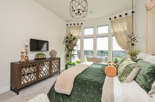 2038 Green Haven Ct, Missouri City, TX 77459 - carpeted bedroom with a chandelier and baseboards