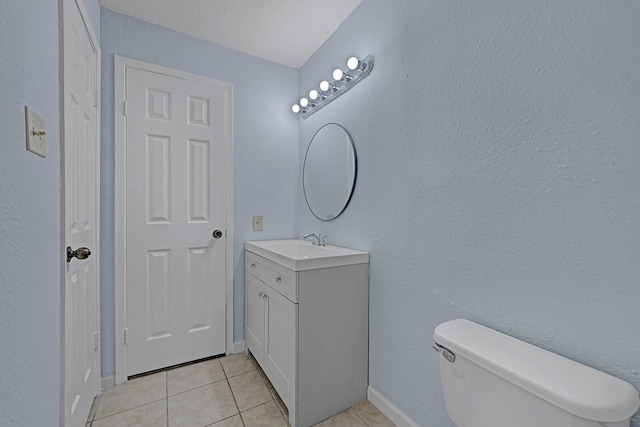 10855 Meadowglen Ln Unit 806, Houston, TX 77042 - bathroom with tile patterned flooring, vanity, toilet, and baseboards