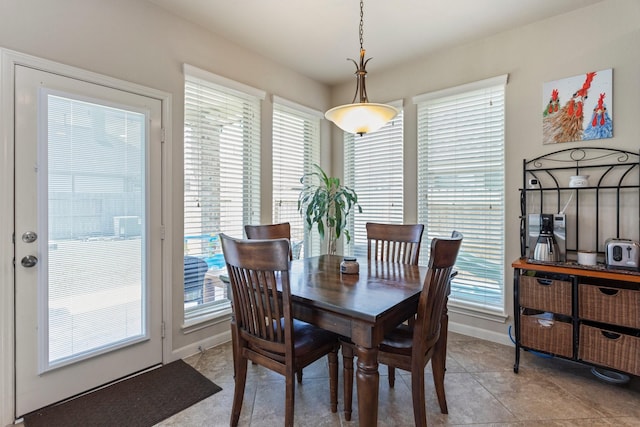 10518 Kicking Horse Pass, Cypress, TX 77433 - dining space with light tile patterned flooring and baseboards