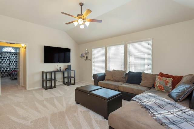 10518 Kicking Horse Pass, Cypress, TX 77433 - living area featuring lofted ceiling, a ceiling fan, baseboards, and light carpet