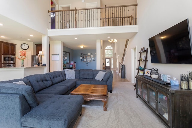 10518 Kicking Horse Pass, Cypress, TX 77433 - living area with a towering ceiling, light colored carpet, a chandelier, and recessed lighting