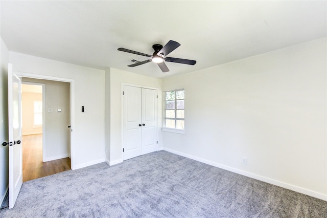 4914 Pershing St, Houston, TX 77033 - unfurnished bedroom featuring carpet, baseboards, a closet, and ceiling fan