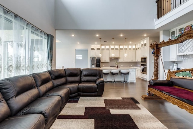 14303 Paseo Marbella Dr, Cypress, TX 77433 - living room with a high ceiling, dark wood finished floors, and recessed lighting