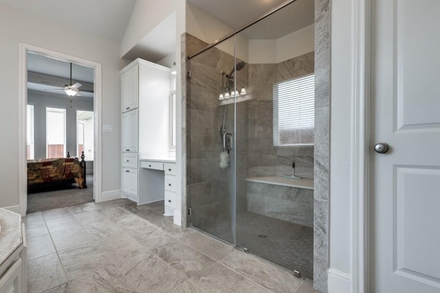 14303 Paseo Marbella Dr, Cypress, TX 77433 - ensuite bathroom featuring a shower stall, a ceiling fan, and baseboards