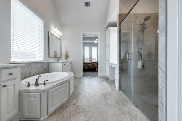14303 Paseo Marbella Dr, Cypress, TX 77433 - bathroom featuring a shower stall, a ceiling fan, connected bathroom, vanity, and a garden tub