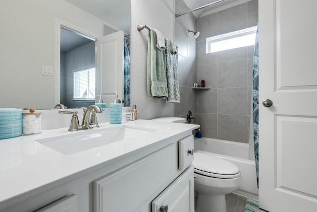 14303 Paseo Marbella Dr, Cypress, TX 77433 - bathroom featuring healthy amount of natural light, shower / tub combo, toilet, and vanity