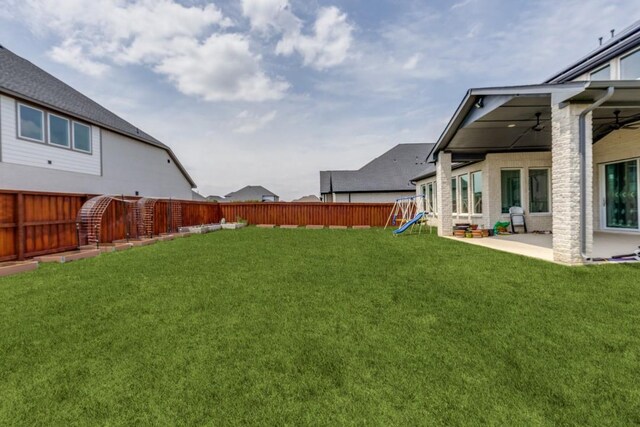 14303 Paseo Marbella Dr, Cypress, TX 77433 - view of yard with a ceiling fan, a playground, and a patio