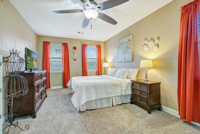 8323 Egret Bay Cir, Baytown, TX 77523 - carpeted bedroom featuring baseboards and ceiling fan
