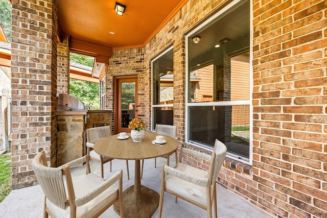 42 Brookefield Cir, Magnolia, TX 77355 - view of patio featuring exterior kitchen