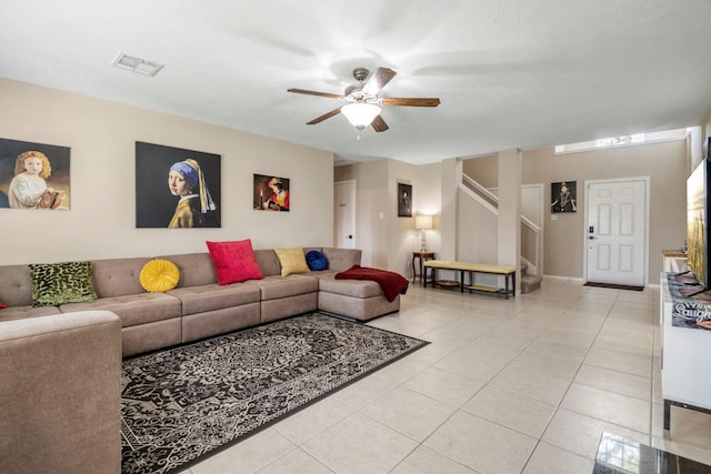 3315 Keygate Dr, Spring, TX 77388 - living area featuring stairway, a ceiling fan, and light tile patterned floors