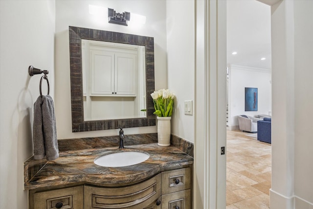 1249 Gardenia Dr, Houston, TX 77018 - bathroom featuring vanity, stone finish flooring, crown molding, and recessed lighting