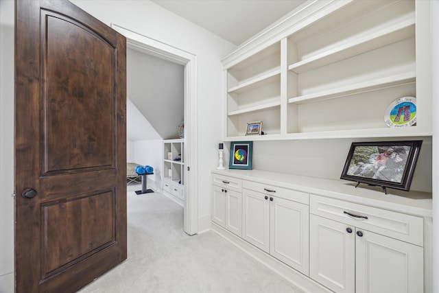 1249 Gardenia Dr, Houston, TX 77018 - corridor with light carpet and vaulted ceiling