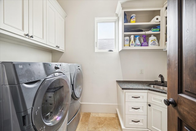 1249 Gardenia Dr, Houston, TX 77018 - laundry area featuring washer and clothes dryer, cabinet space, and baseboards