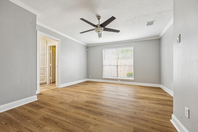 12124 Burdine St, Houston, TX 77035 - empty room featuring ornamental molding, a textured wall, wood finished floors, a ceiling fan, and a textured ceiling