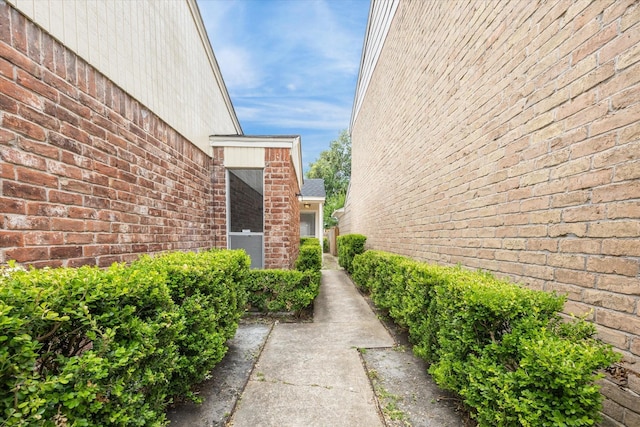 12124 Burdine St, Houston, TX 77035 - view of home's exterior featuring brick siding