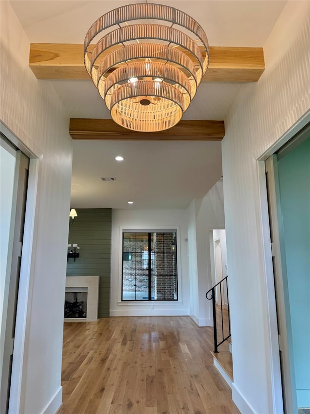 1701 Bayram Dr, Houston, TX 77055 - hallway with beam ceiling, wood finished floors, and recessed lighting
