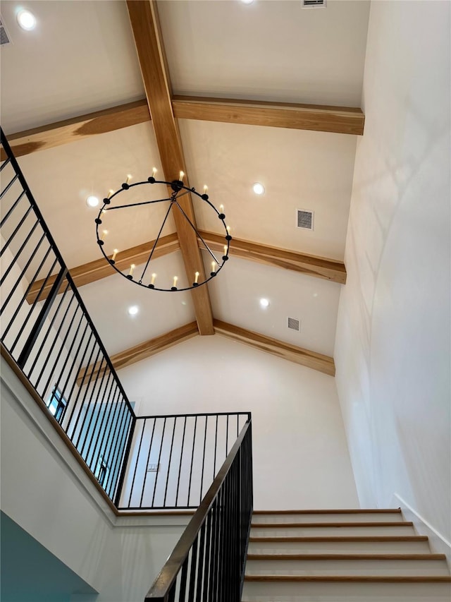 1701 Bayram Dr, Houston, TX 77055 - stairway featuring a chandelier and recessed lighting