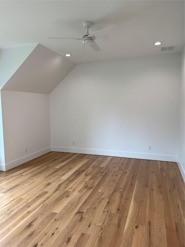 1701 Bayram Dr, Houston, TX 77055 - bonus room featuring a ceiling fan, baseboards, vaulted ceiling, wood finished floors, and recessed lighting