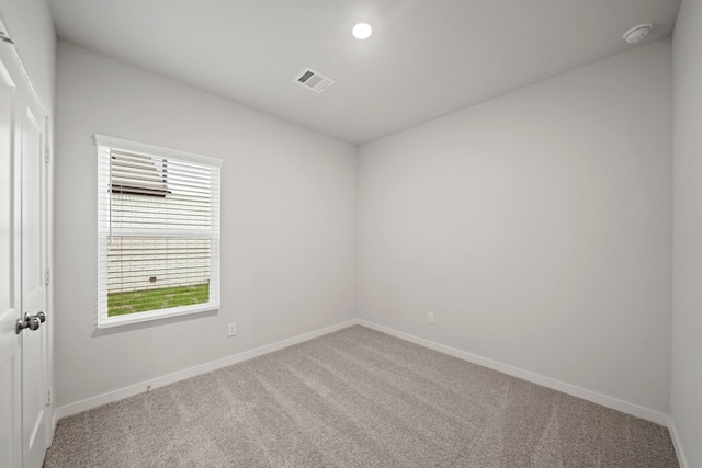 758 Westpointe Dr, Dayton, TX 77535 - spare room with carpet flooring, baseboards, a smoke detector, and recessed lighting