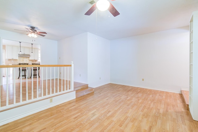 1708 Capstan Rd, Houston, TX 77062 - spare room with ceiling fan, light wood-style flooring, and baseboards