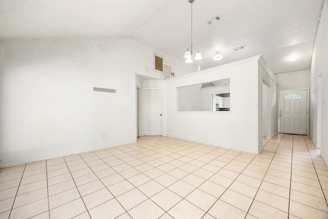 18627 Spinney Lane Dr, Cypress, TX 77433 - empty room with lofted ceiling, a chandelier, and light tile patterned floors