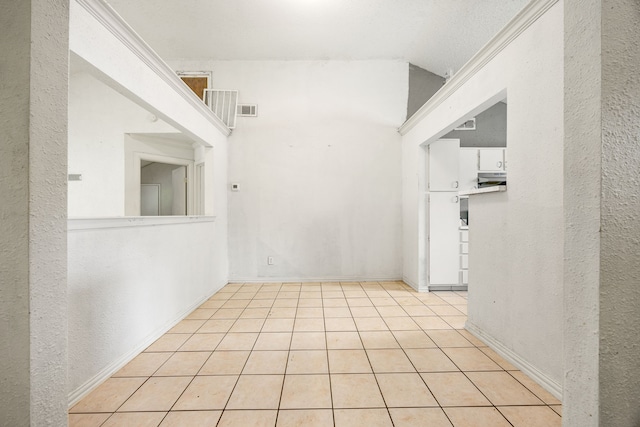 18627 Spinney Lane Dr, Cypress, TX 77433 - tiled empty room with baseboards and a textured wall