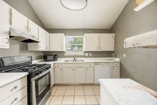18627 Spinney Lane Dr, Cypress, TX 77433 - kitchen with stainless steel gas range oven, dishwasher, under cabinet range hood, black microwave, and a sink
