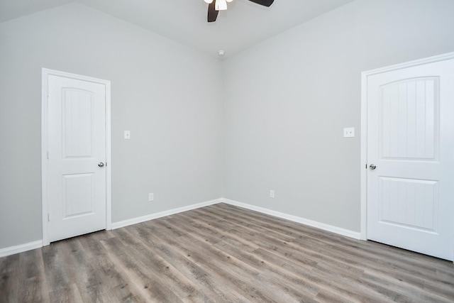 11819 Eagle Ridge Dr, Mont Belvieu, TX 77535 - unfurnished room with ceiling fan, wood finished floors, baseboards, and lofted ceiling