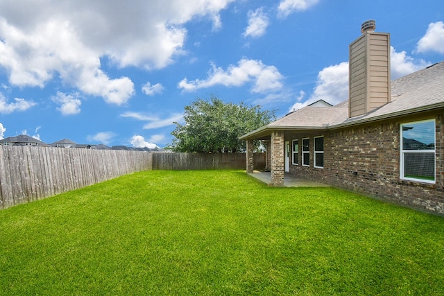 11819 Eagle Ridge Dr, Mont Belvieu, TX 77535 - view of yard with a patio area