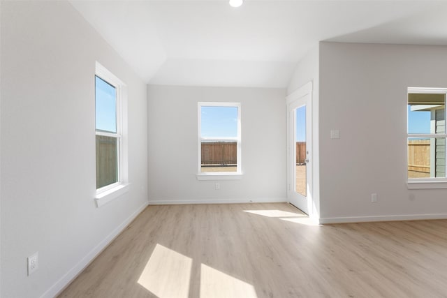 4609 Peony Green Dr, Katy, TX 77493 - spare room featuring wood finished floors and lofted ceiling