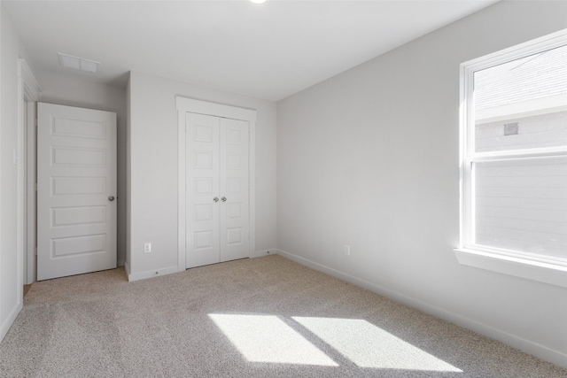 4609 Peony Green Dr, Katy, TX 77493 - unfurnished bedroom with carpet floors and a closet