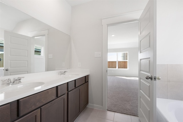 4609 Peony Green Dr, Katy, TX 77493 - full bath featuring double vanity, tile patterned floors, and a tub