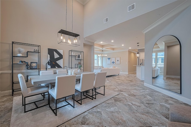 442 Imperial Blvd, Sugar Land, TX 77498 - dining room with a chandelier, baseboards, ornamental molding, plenty of natural light, and a towering ceiling