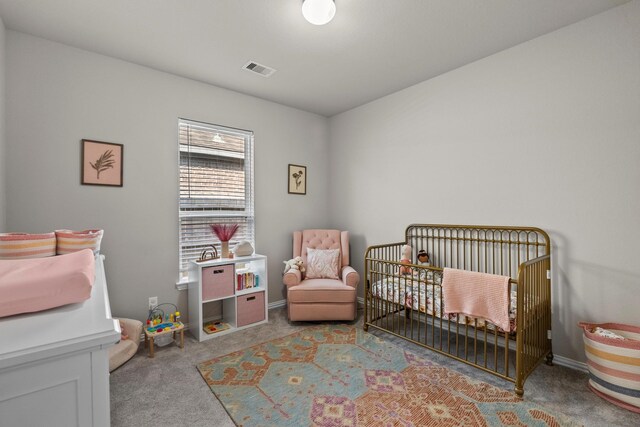 2525 Galley Ridge Dr, La Marque, TX 77568 - carpeted bedroom with a nursery area and baseboards