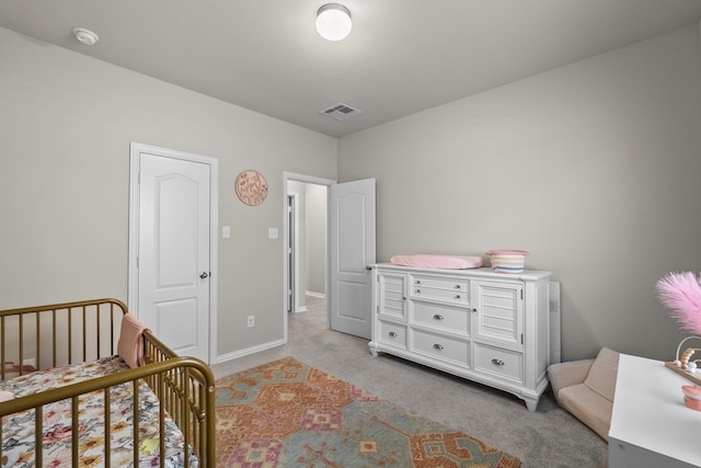 2525 Galley Ridge Dr, La Marque, TX 77568 - bedroom featuring light carpet, a nursery area, and baseboards