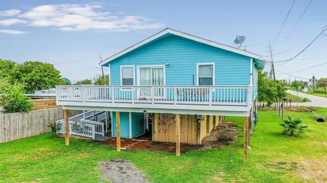 1004 20th St, Dickinson, TX 77539 - rear view of property featuring a wooden deck and stairs