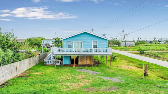 1004 20th St, Dickinson, TX 77539 - back of house with a wooden deck and stairs