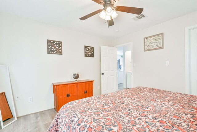 1004 20th St, Dickinson, TX 77539 - bedroom featuring light wood finished floors and a ceiling fan