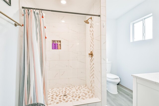 1004 20th St, Dickinson, TX 77539 - bathroom featuring toilet, a shower stall, vanity, and recessed lighting