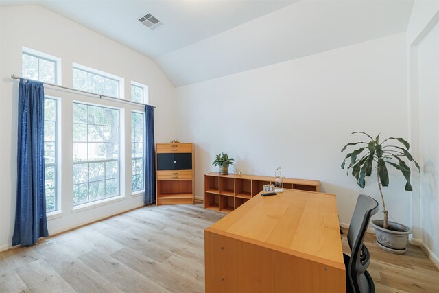 26122 Savory Springs Ln, Katy, TX 77494 - office area with vaulted ceiling, light wood-style flooring, and baseboards