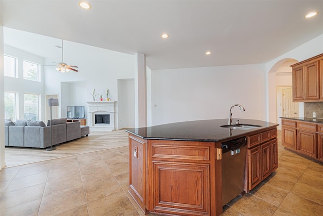 26122 Savory Springs Ln, Katy, TX 77494 - kitchen featuring a sink, dishwasher, ceiling fan, an island with sink, and backsplash