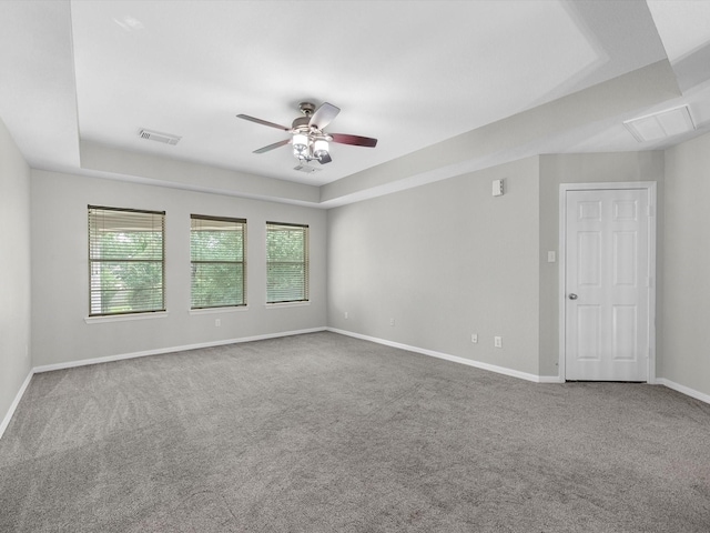 20211 Sunrise Glen Ct, Spring, TX 77379 - carpeted empty room with a ceiling fan, baseboards, and a raised ceiling